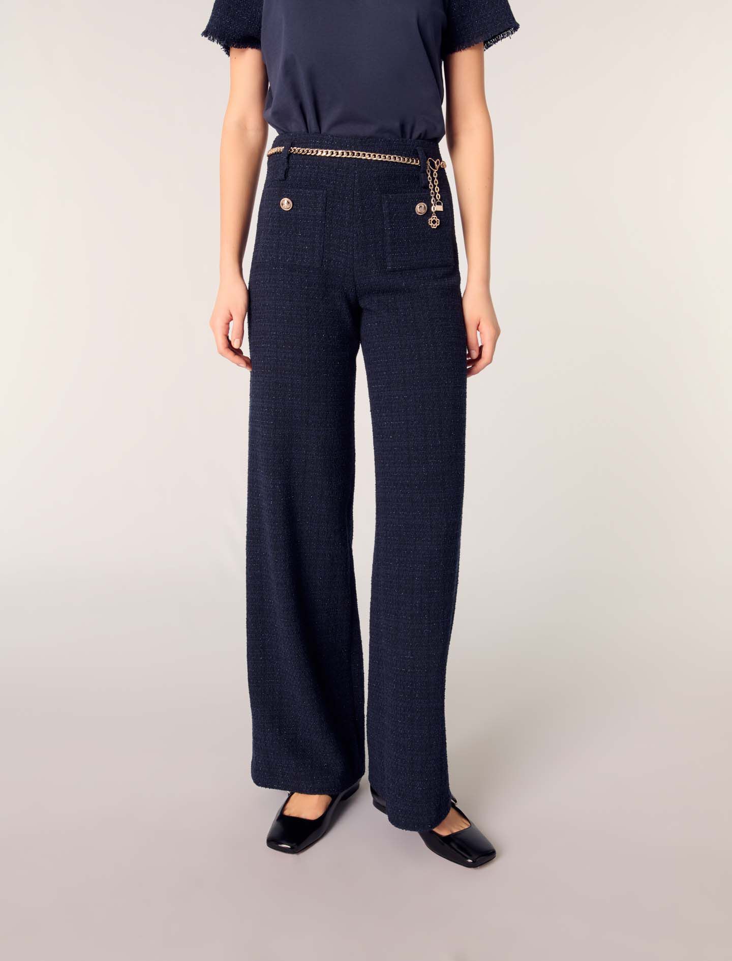 Tweed trousers with chain belt