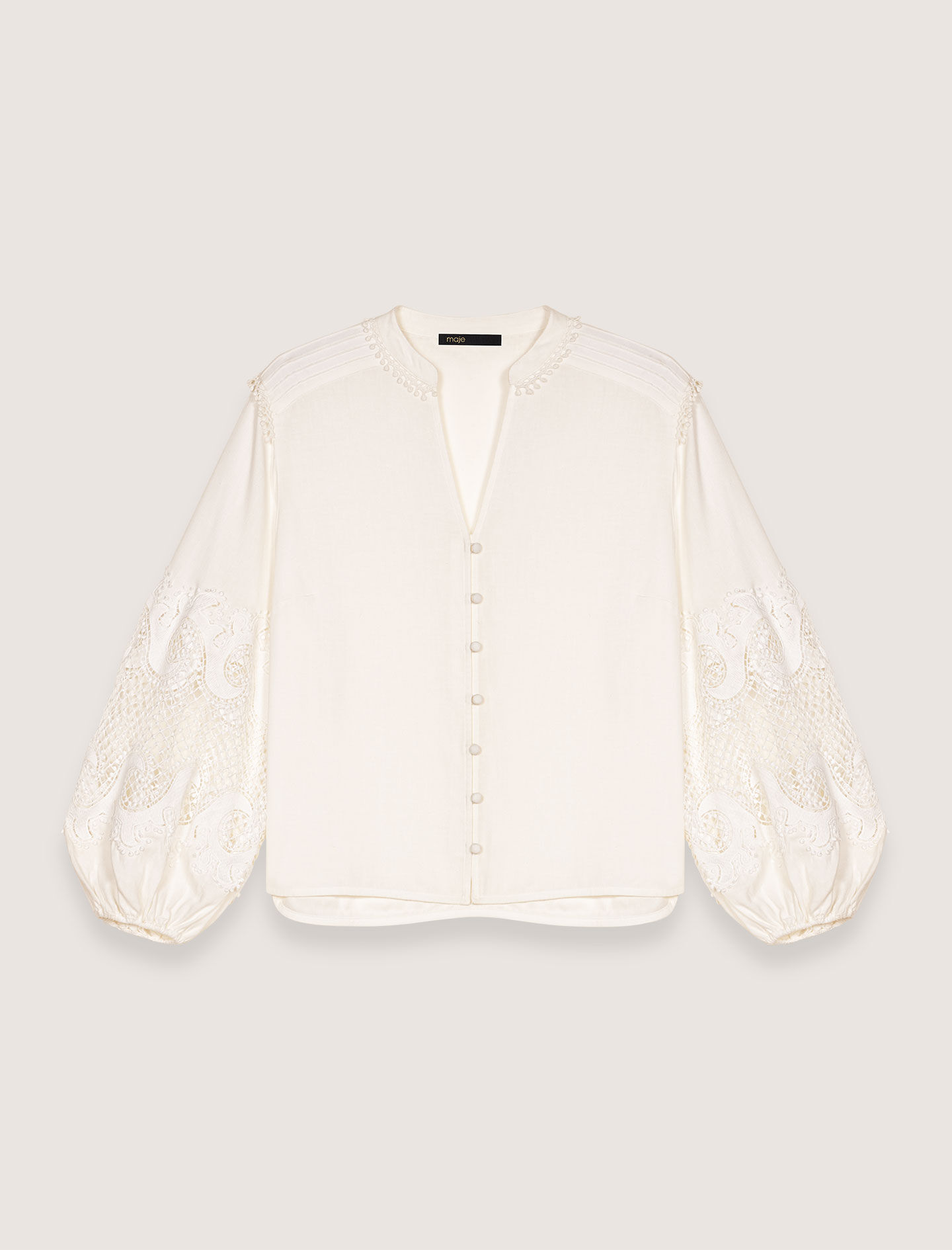 Shirt with embroidered sleeves