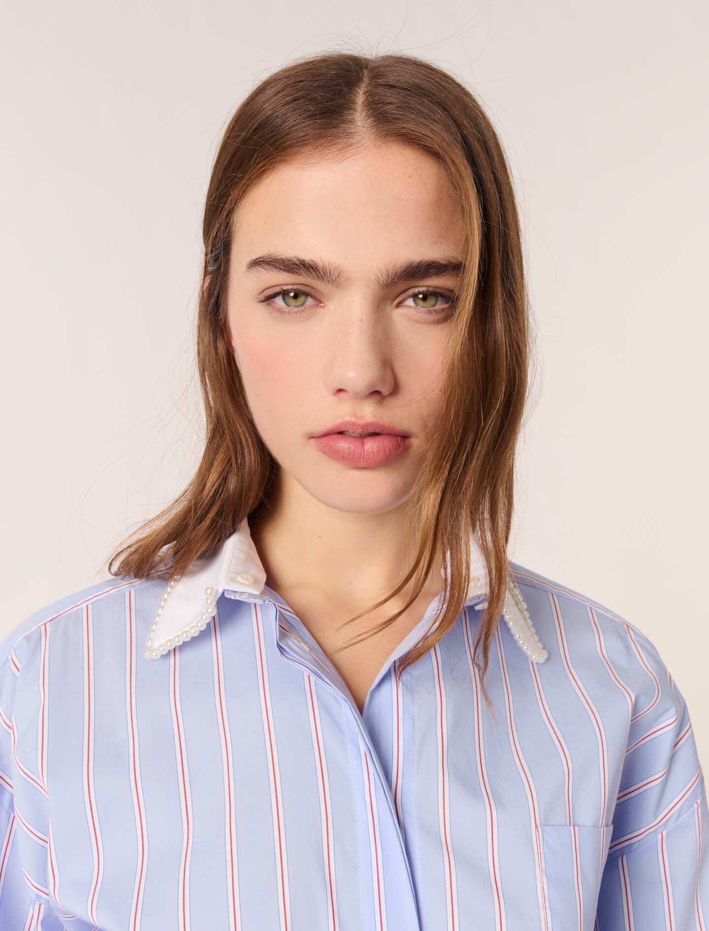 Striped shirt with beaded collar
