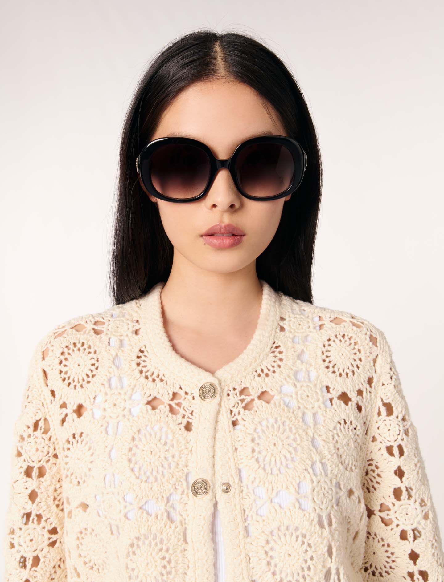 Crocheted cropped cardigan