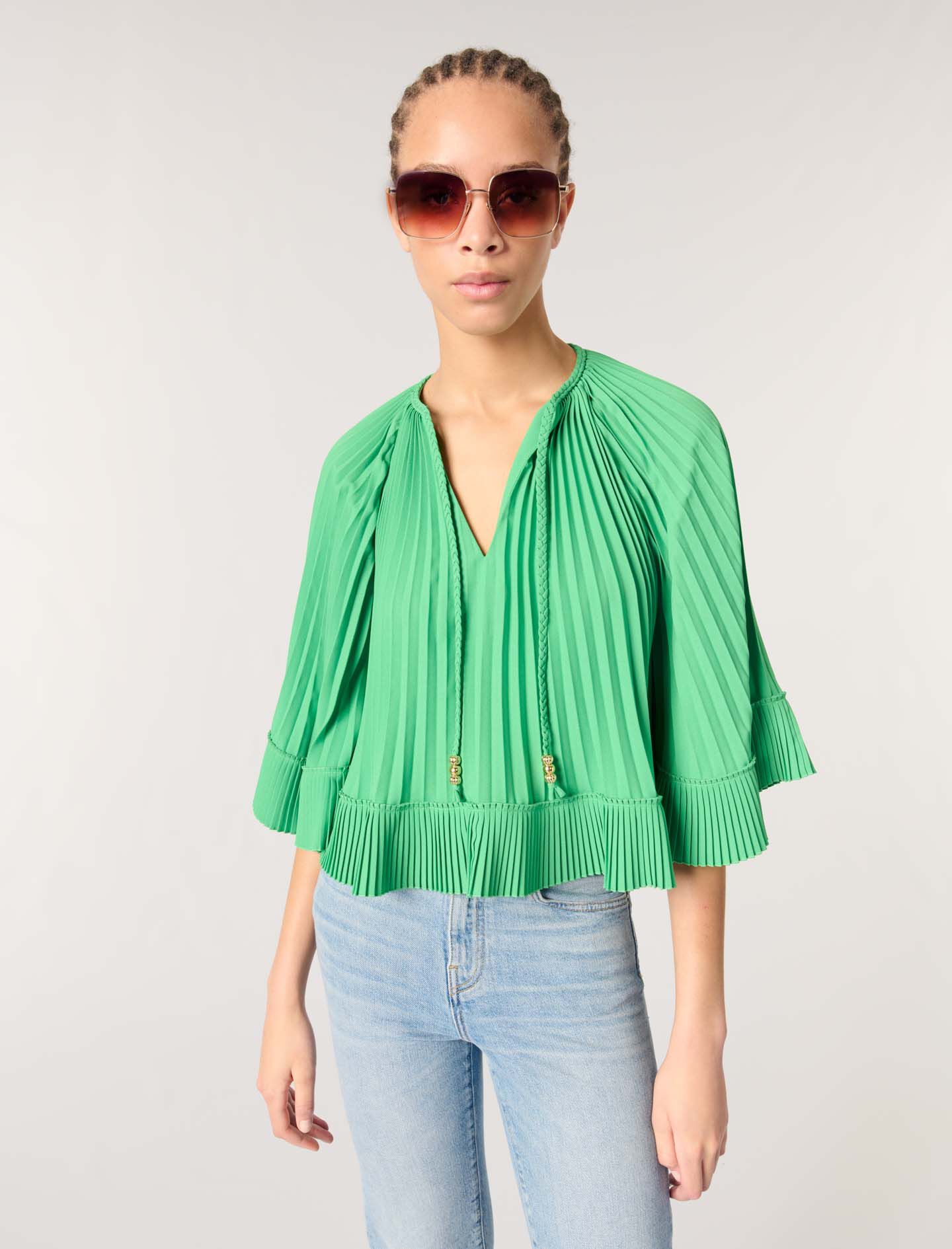 Cape-effect pleated top