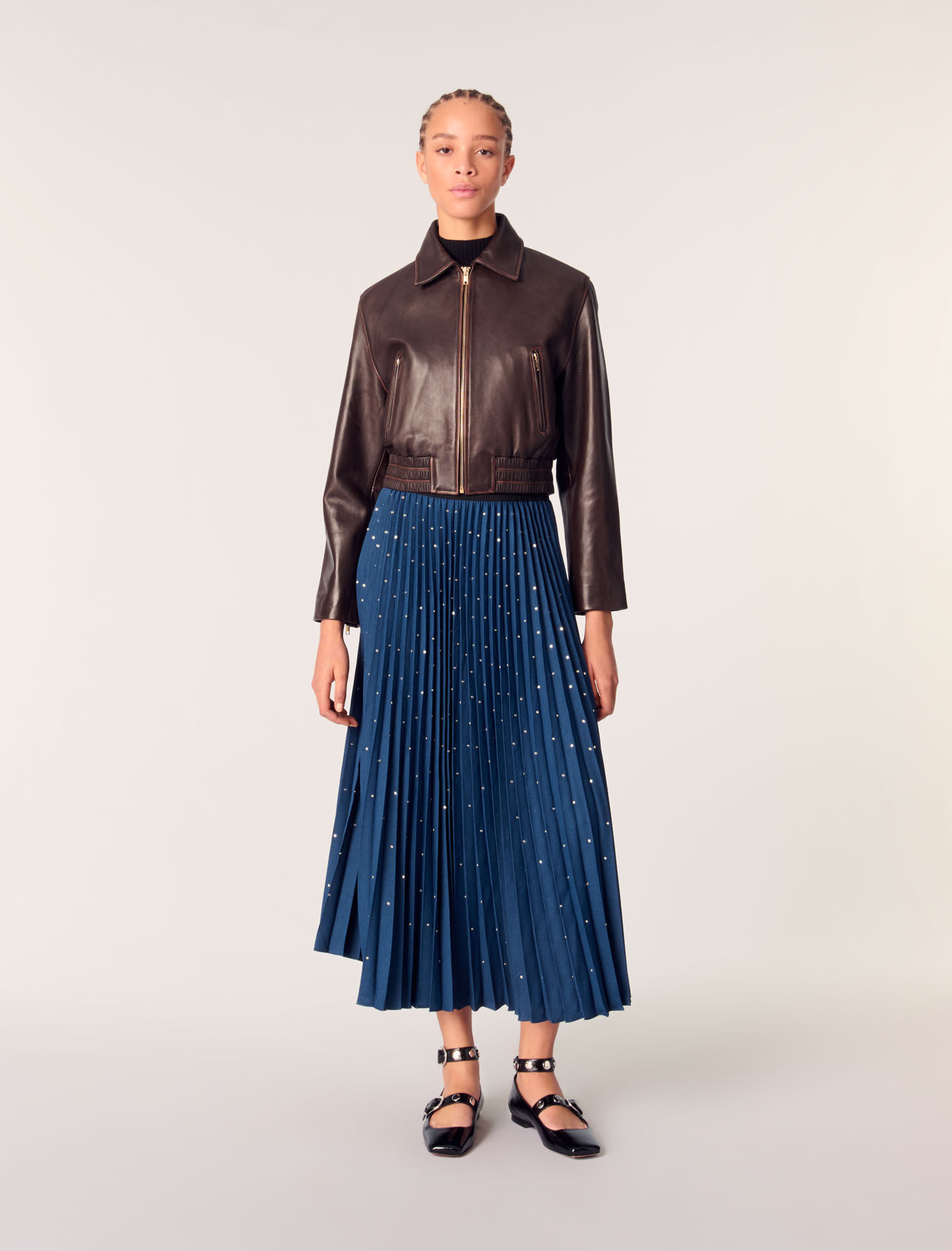 Long pleated skirt with studs