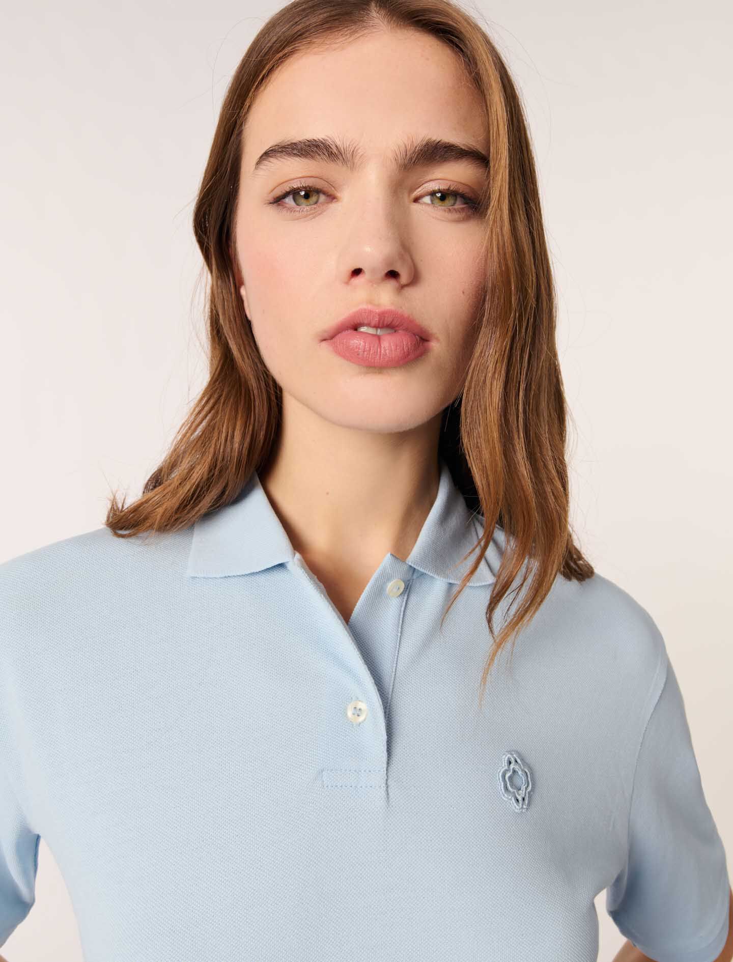 Polo shirt with logo patch