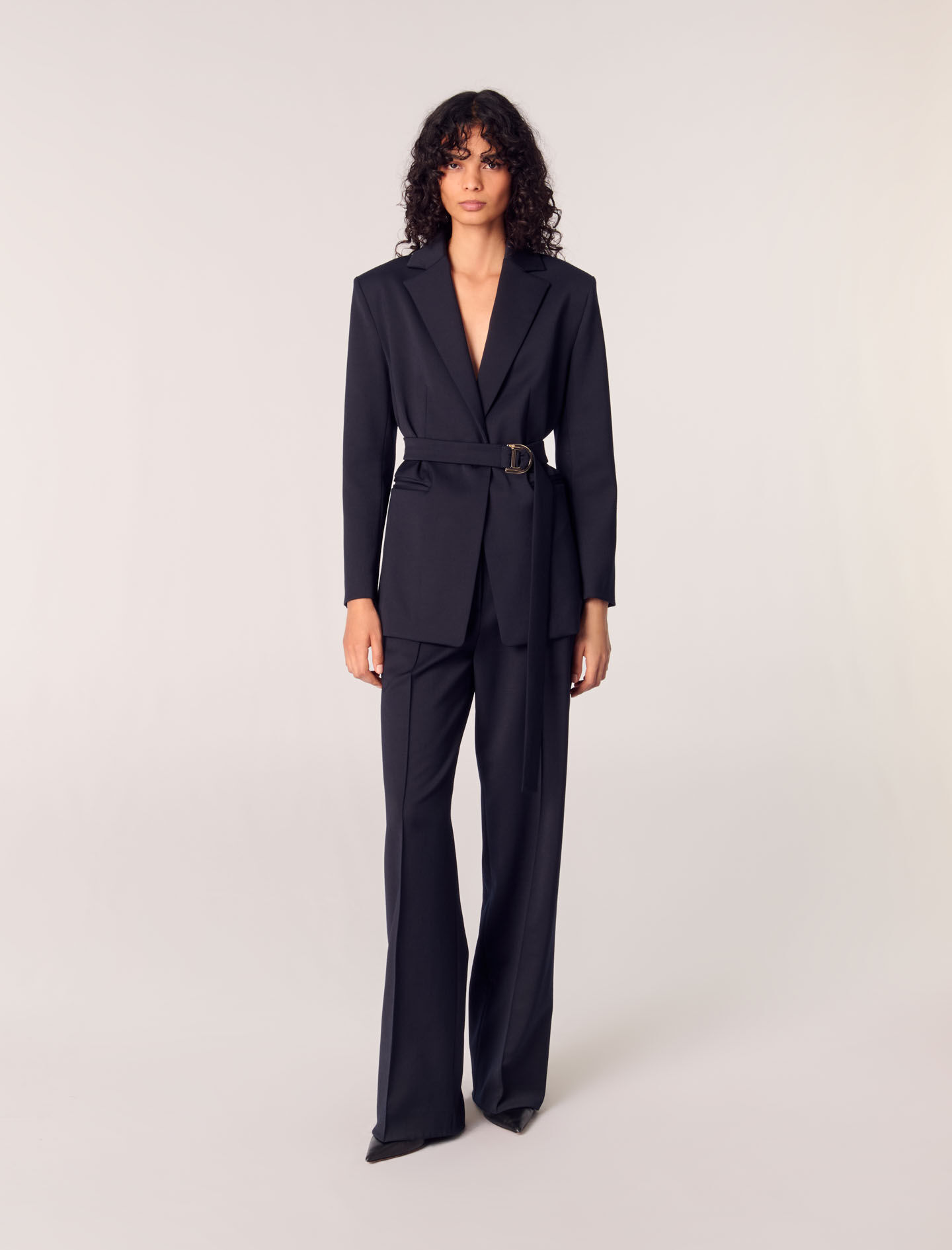 Suit jacket with pleated back