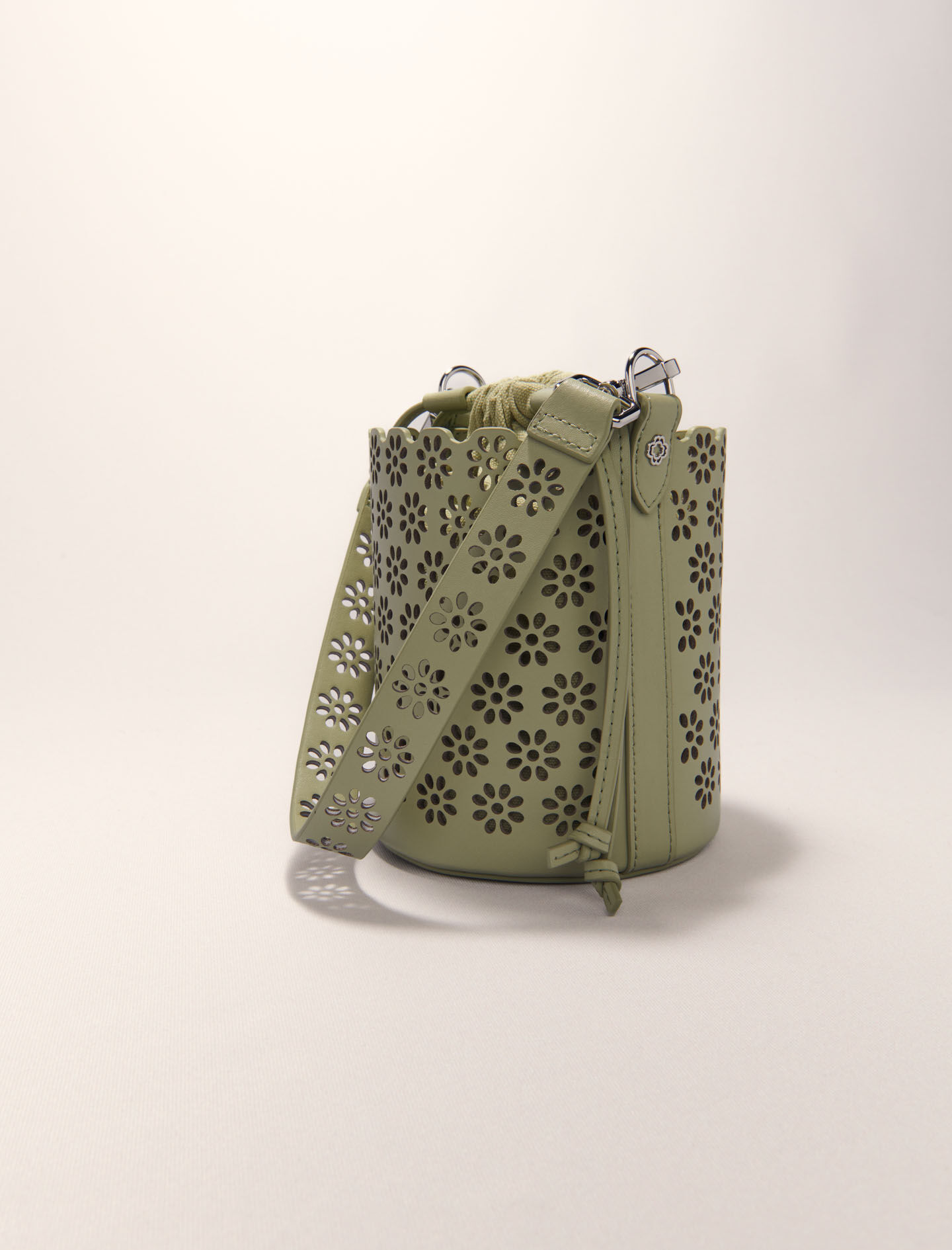 Perforated leather bucket bag