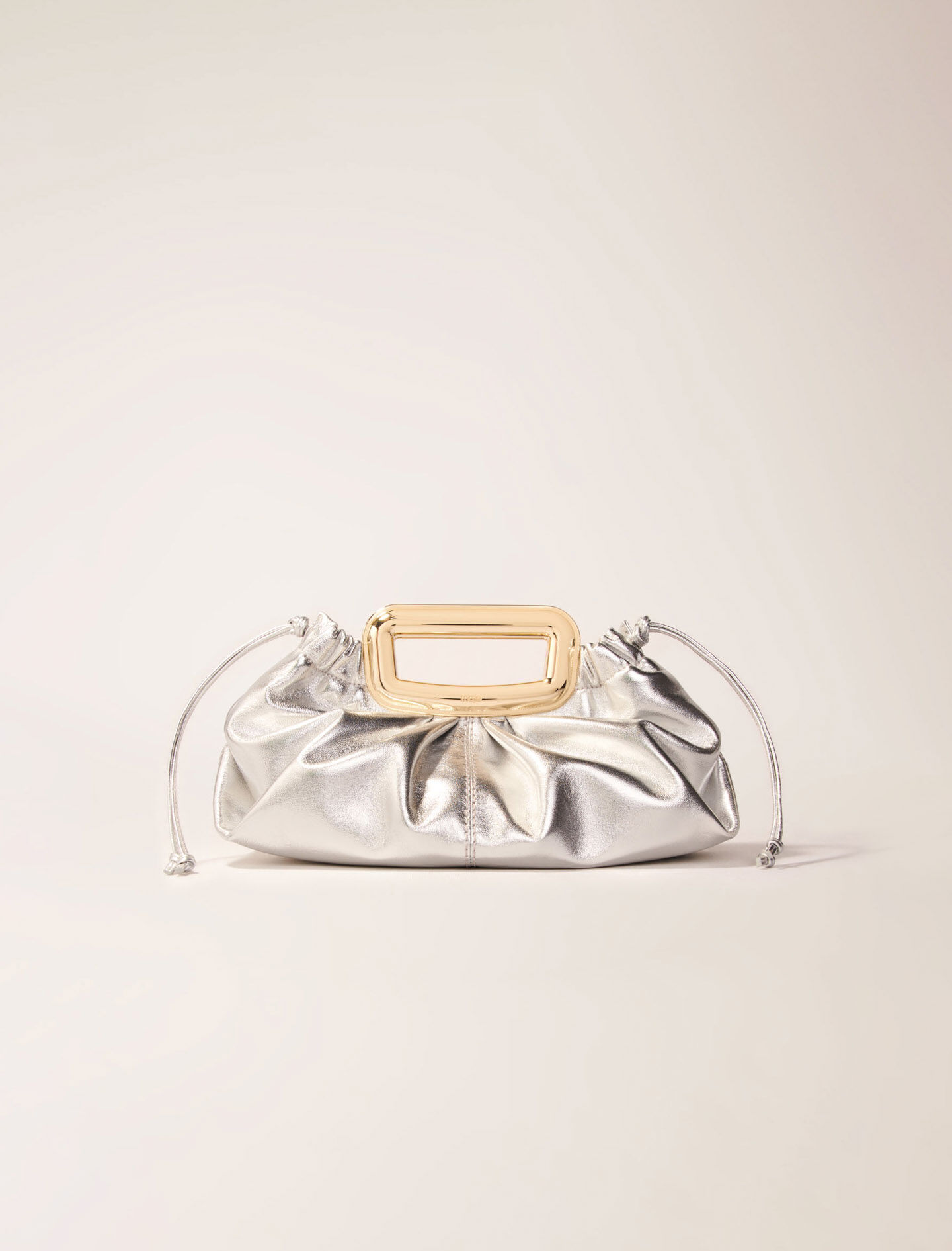 Metal handle leather clutch