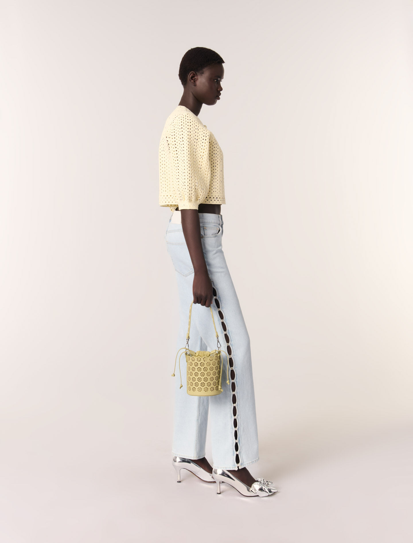 Perforated leather bucket bag
