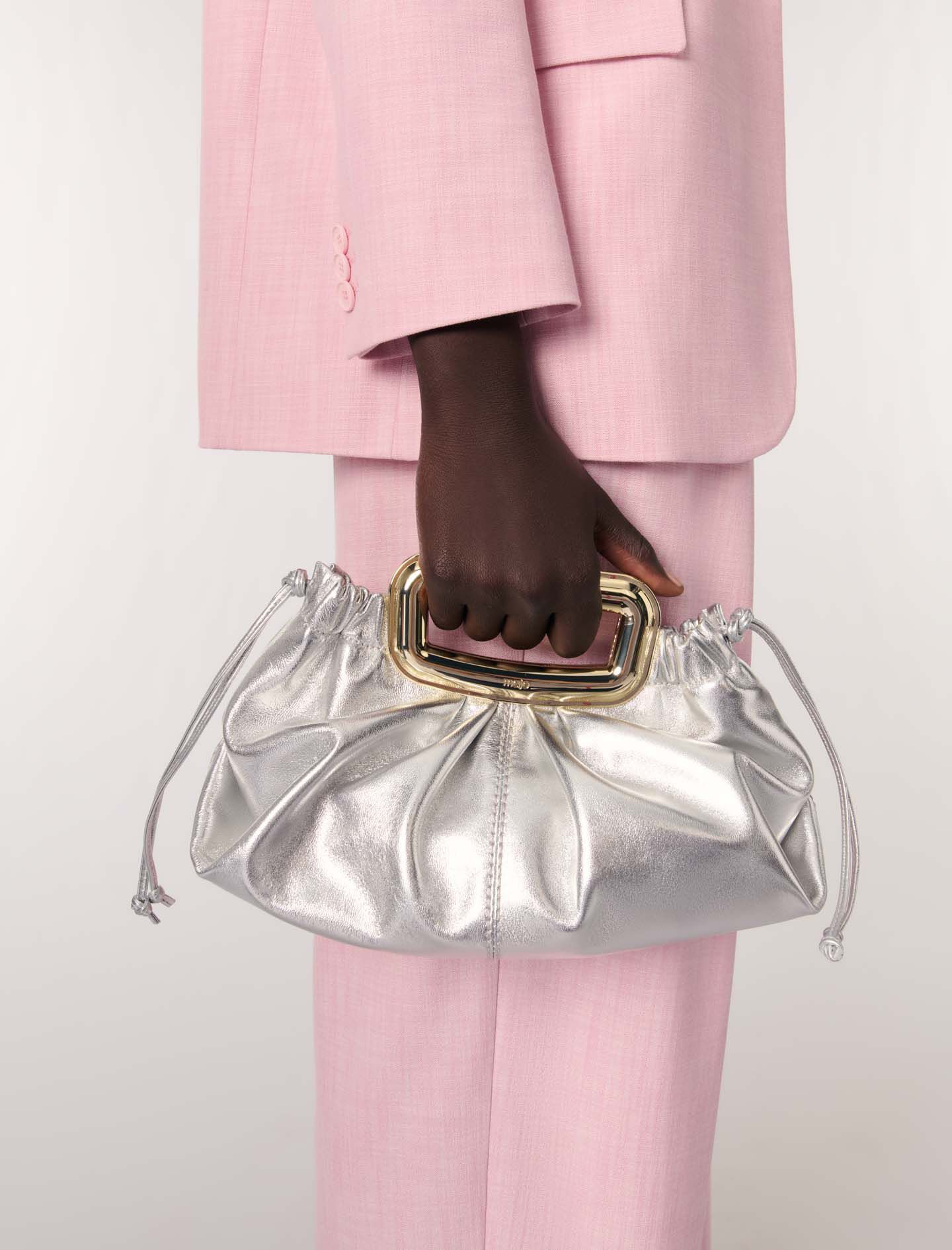 Metal handle metal leather clutch