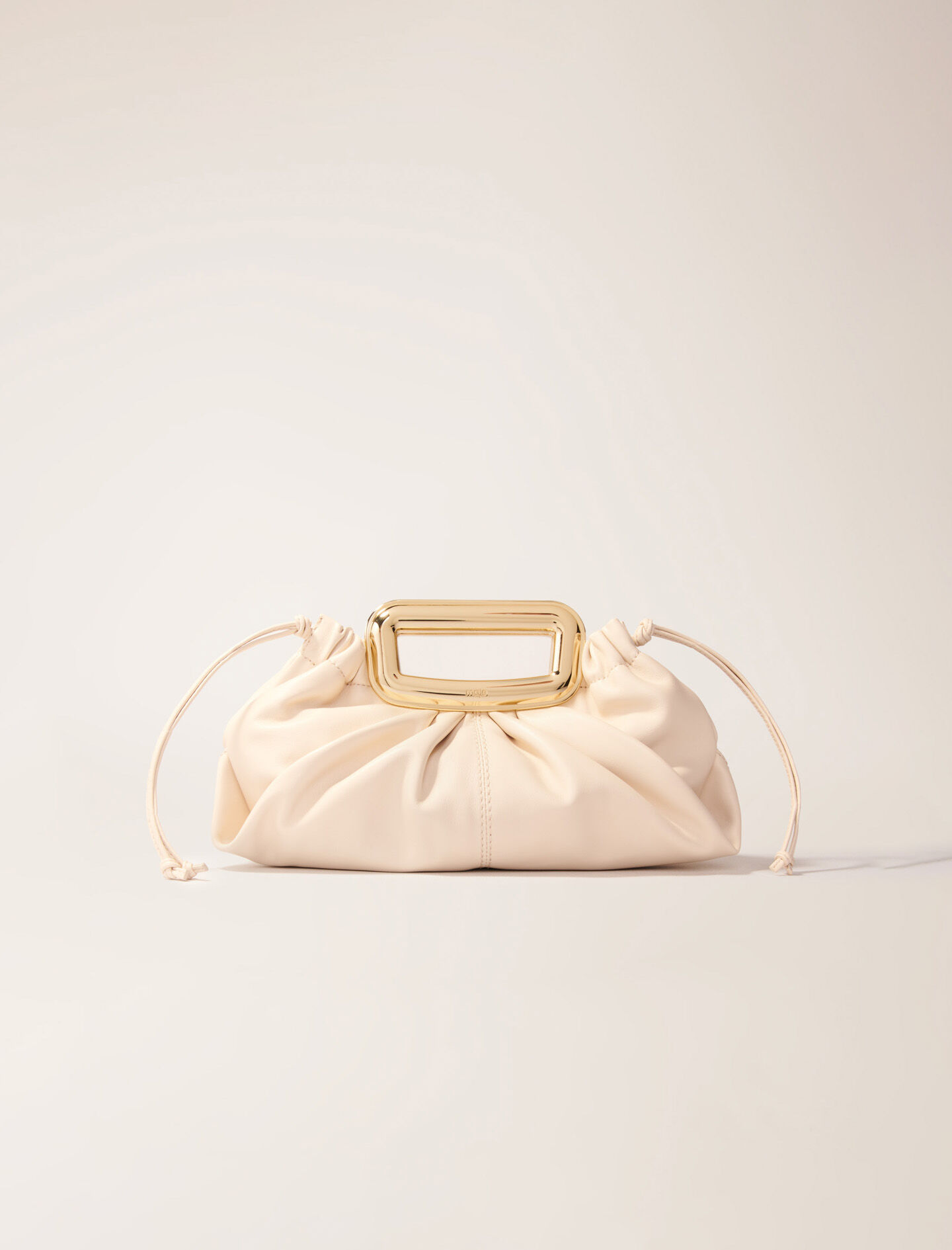 Metal handle leather clutch