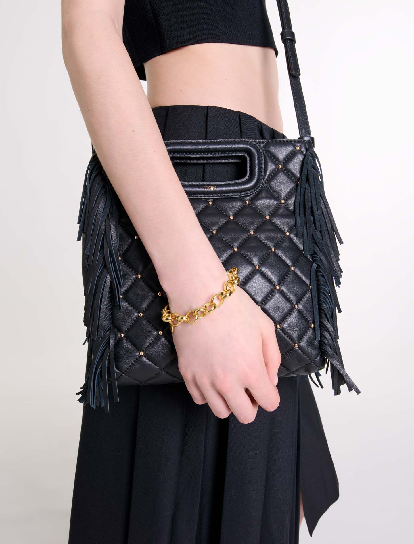 M bag in studded, quilted leather