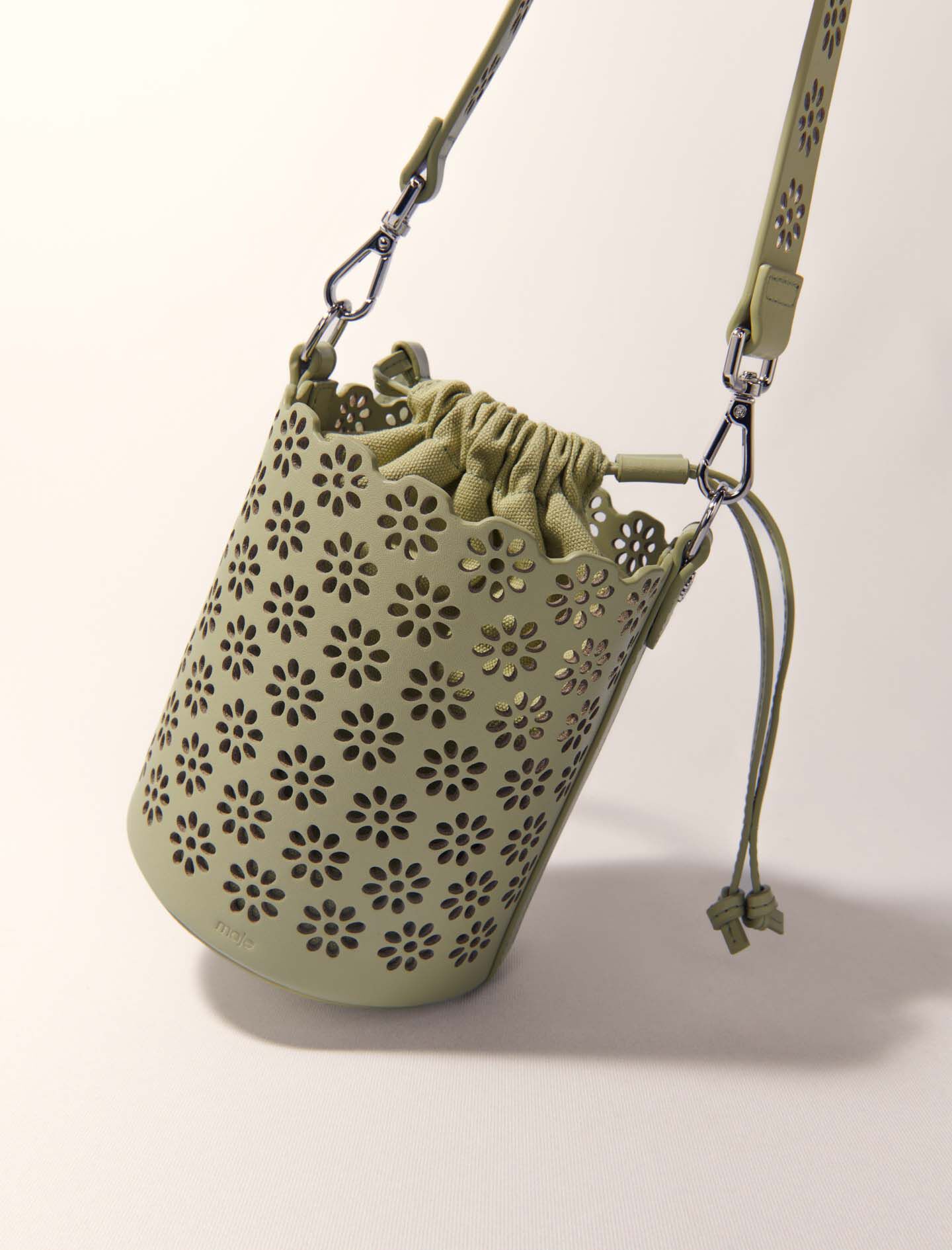 Perforated leather bucket bag
