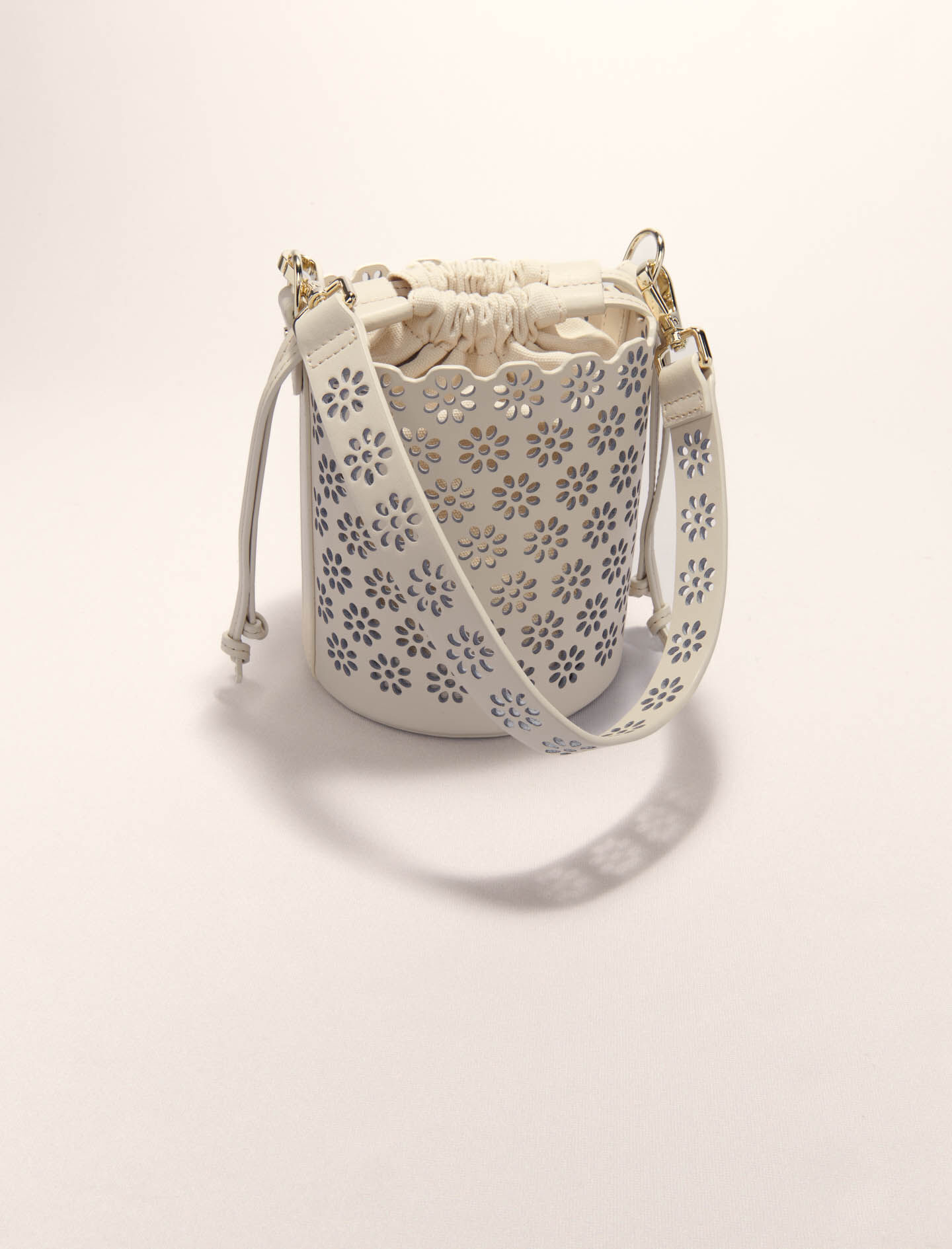 Perforated leather bucket bag