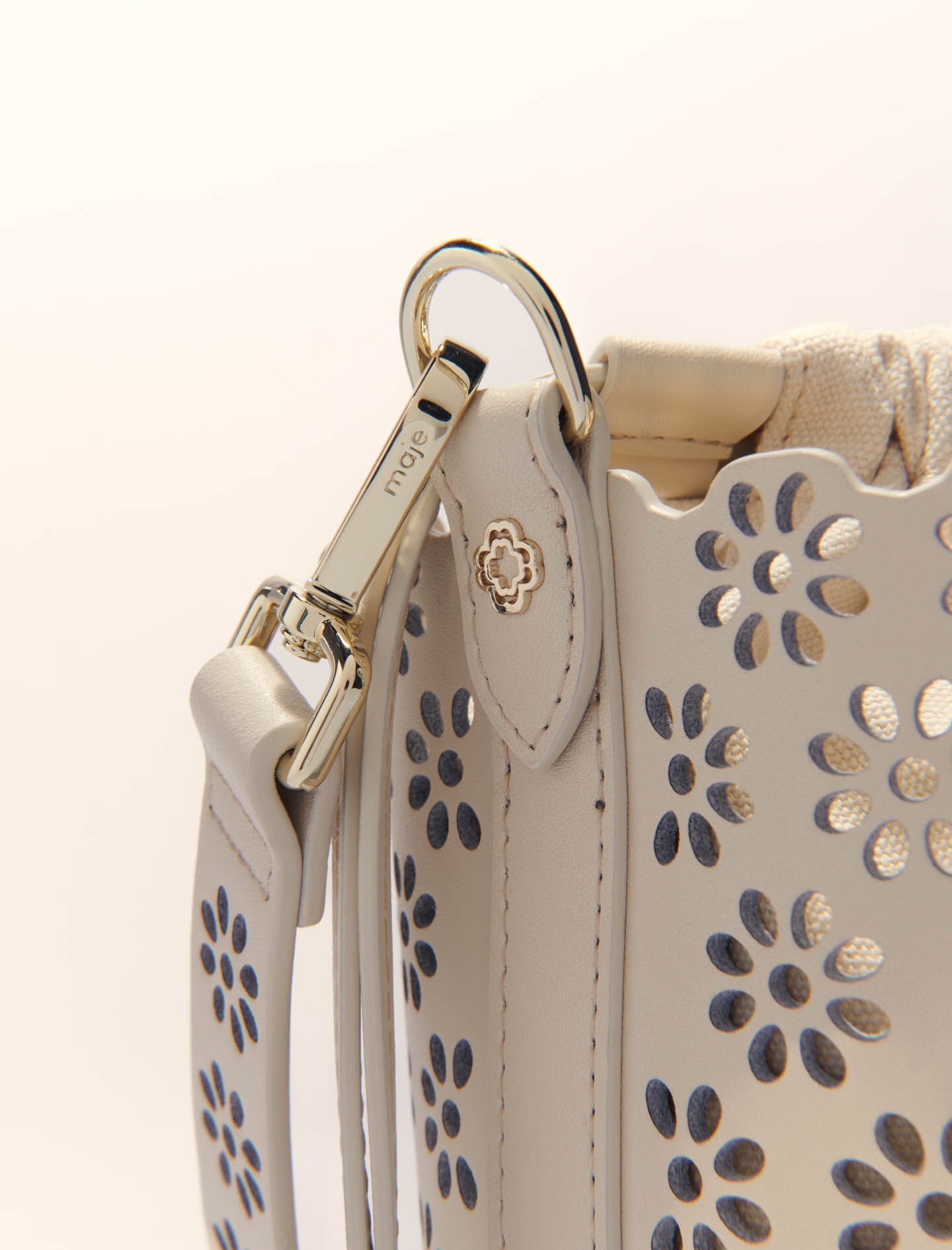 Perforated leather bucket bag