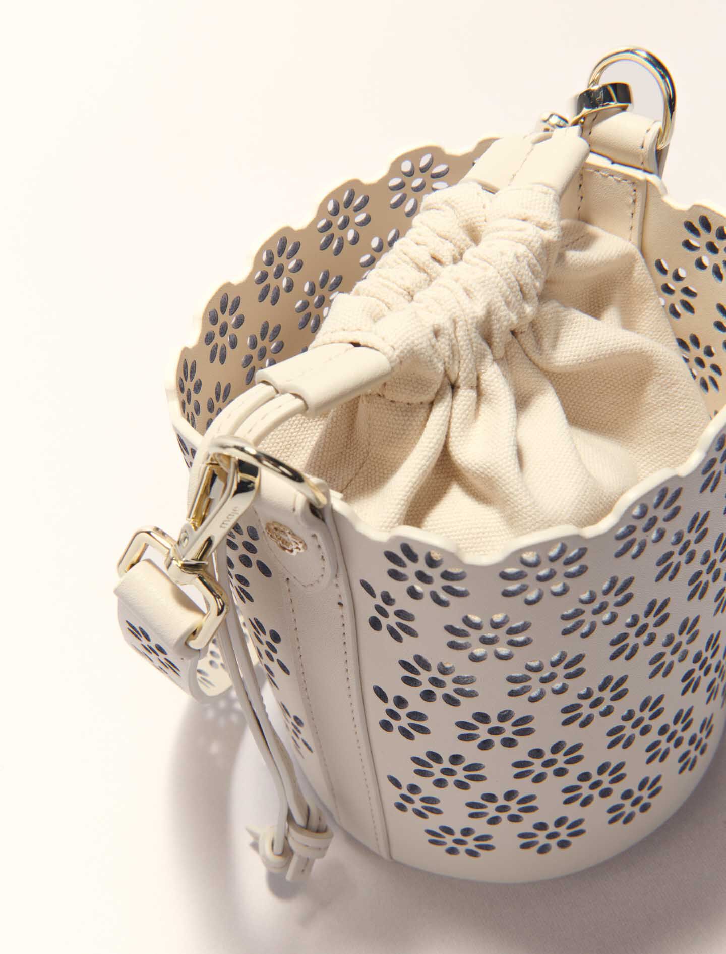 Perforated leather bucket bag