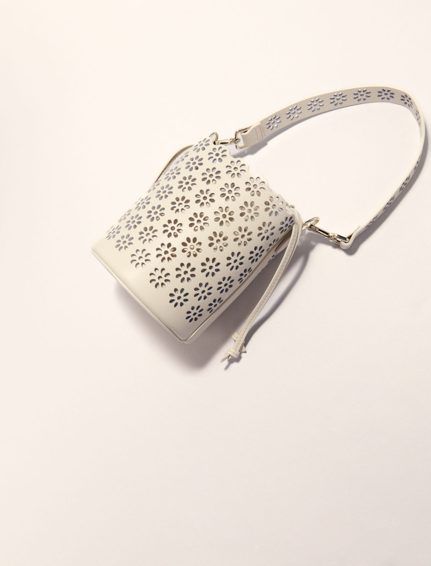 Perforated leather bucket bag