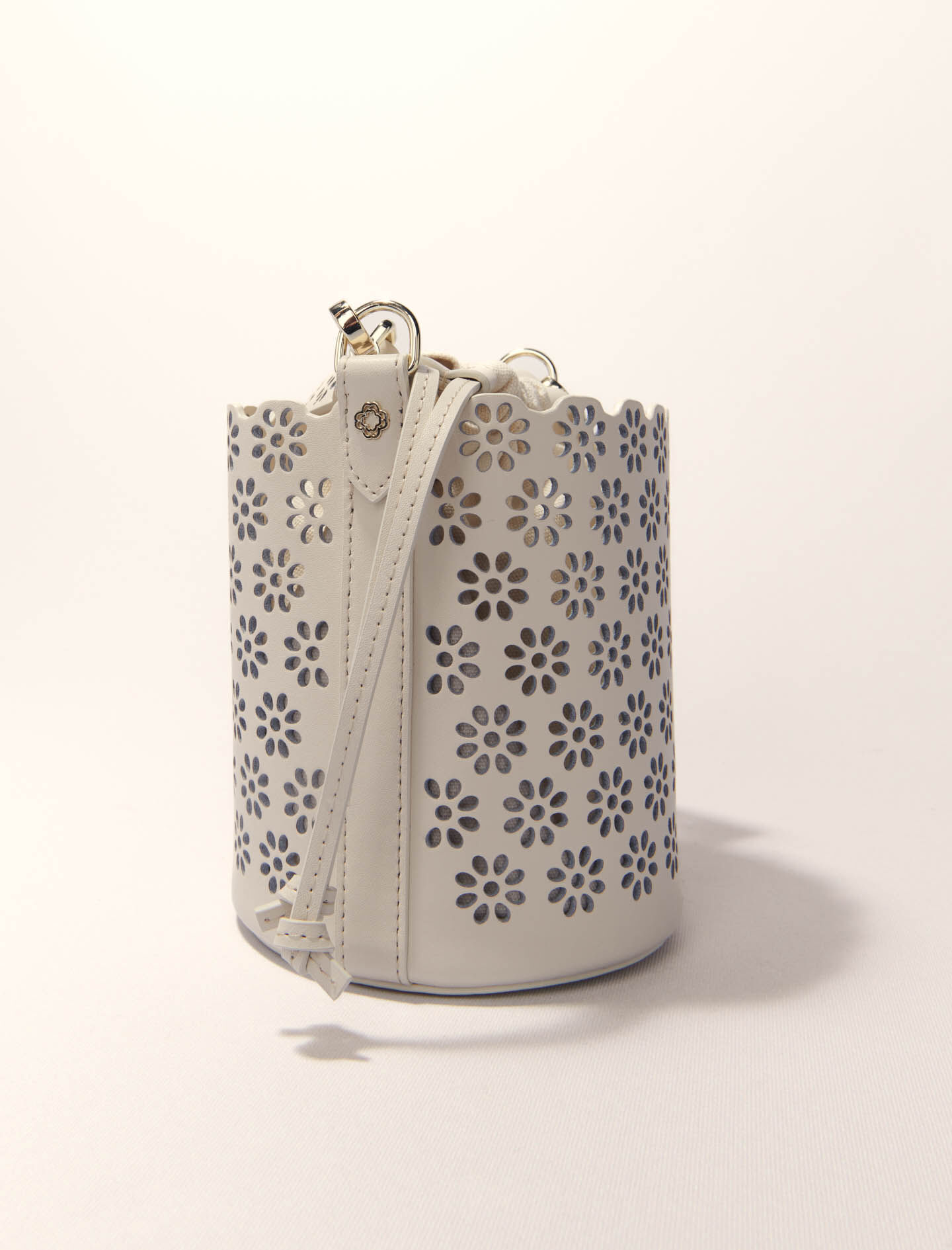 Perforated leather bucket bag