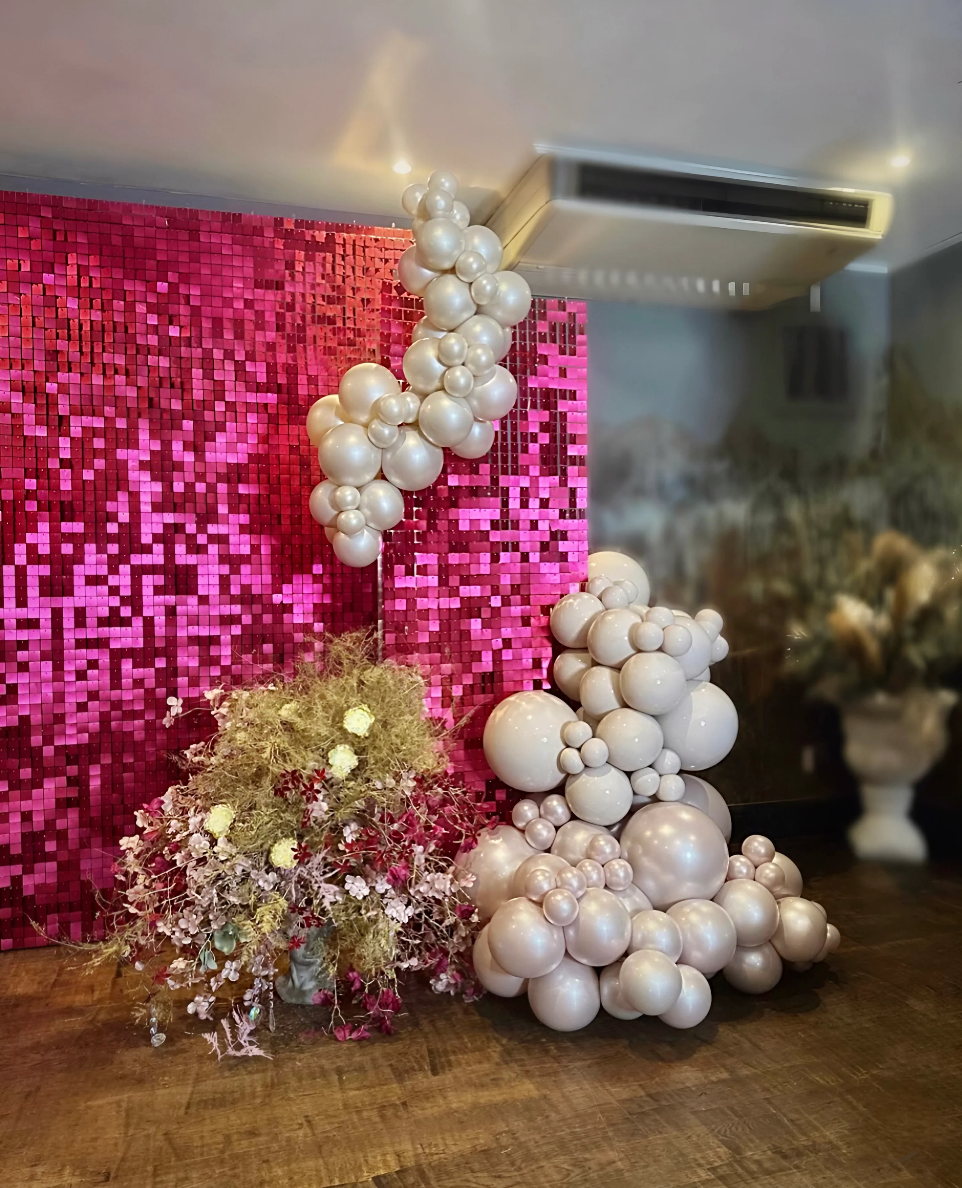 “Raspberry” pink sequin wall