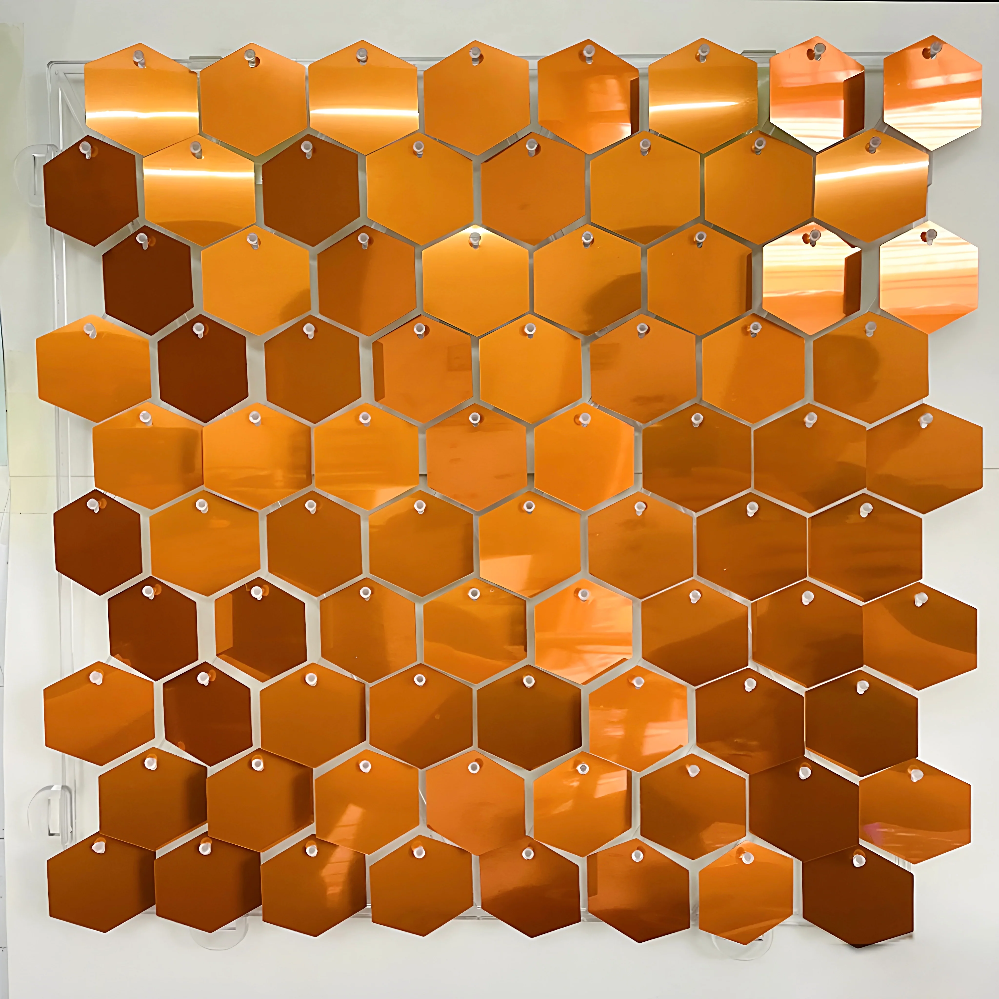 New burnt orange mirror hexagonal sequin wall