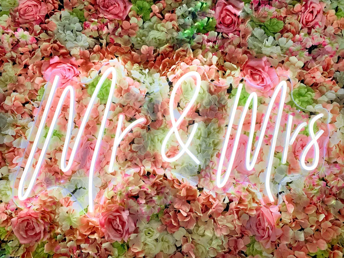 Neon “MR & MRS” sign in cool white