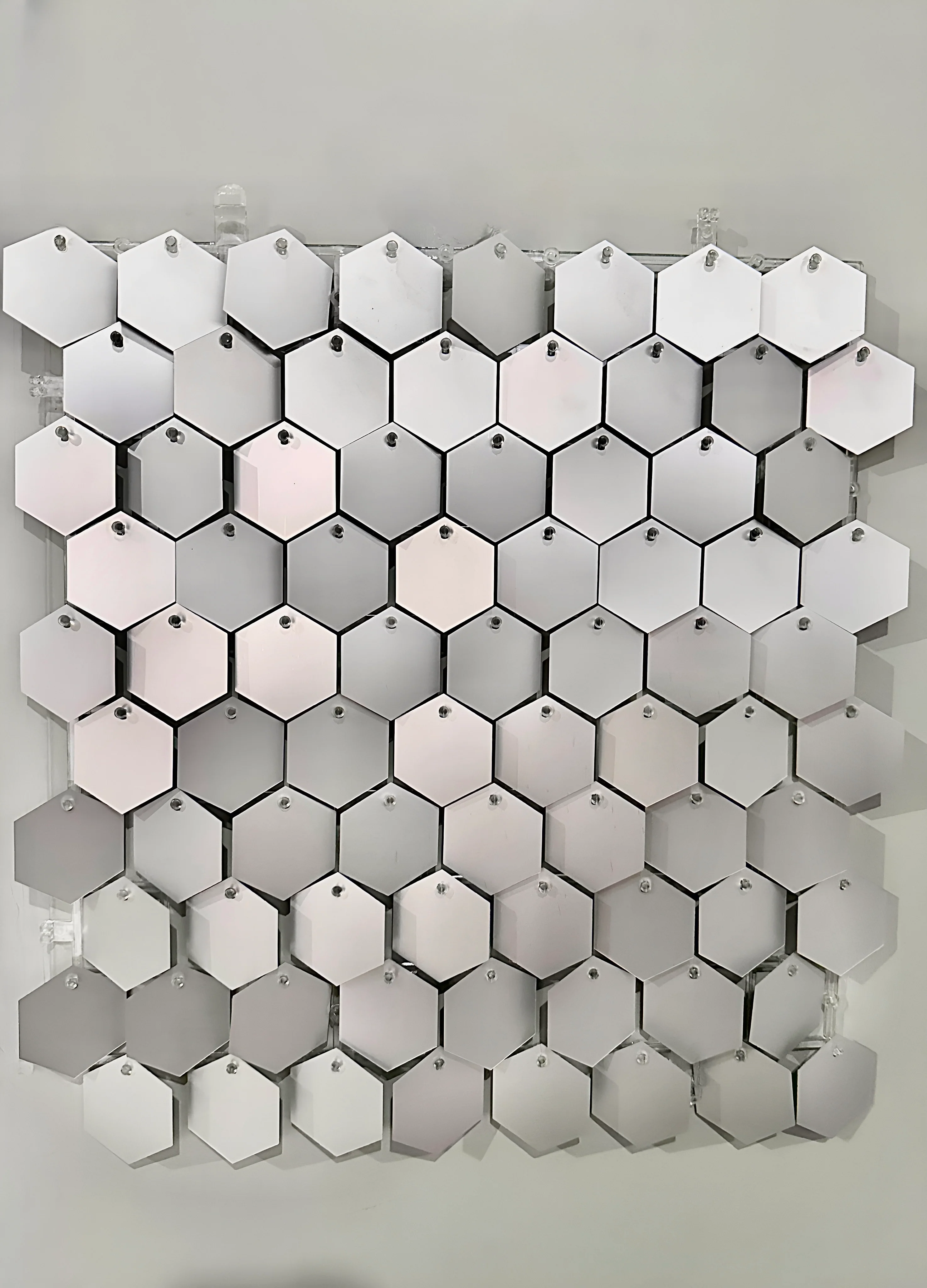 New “Ice” matte silver hexagonal sequin wall