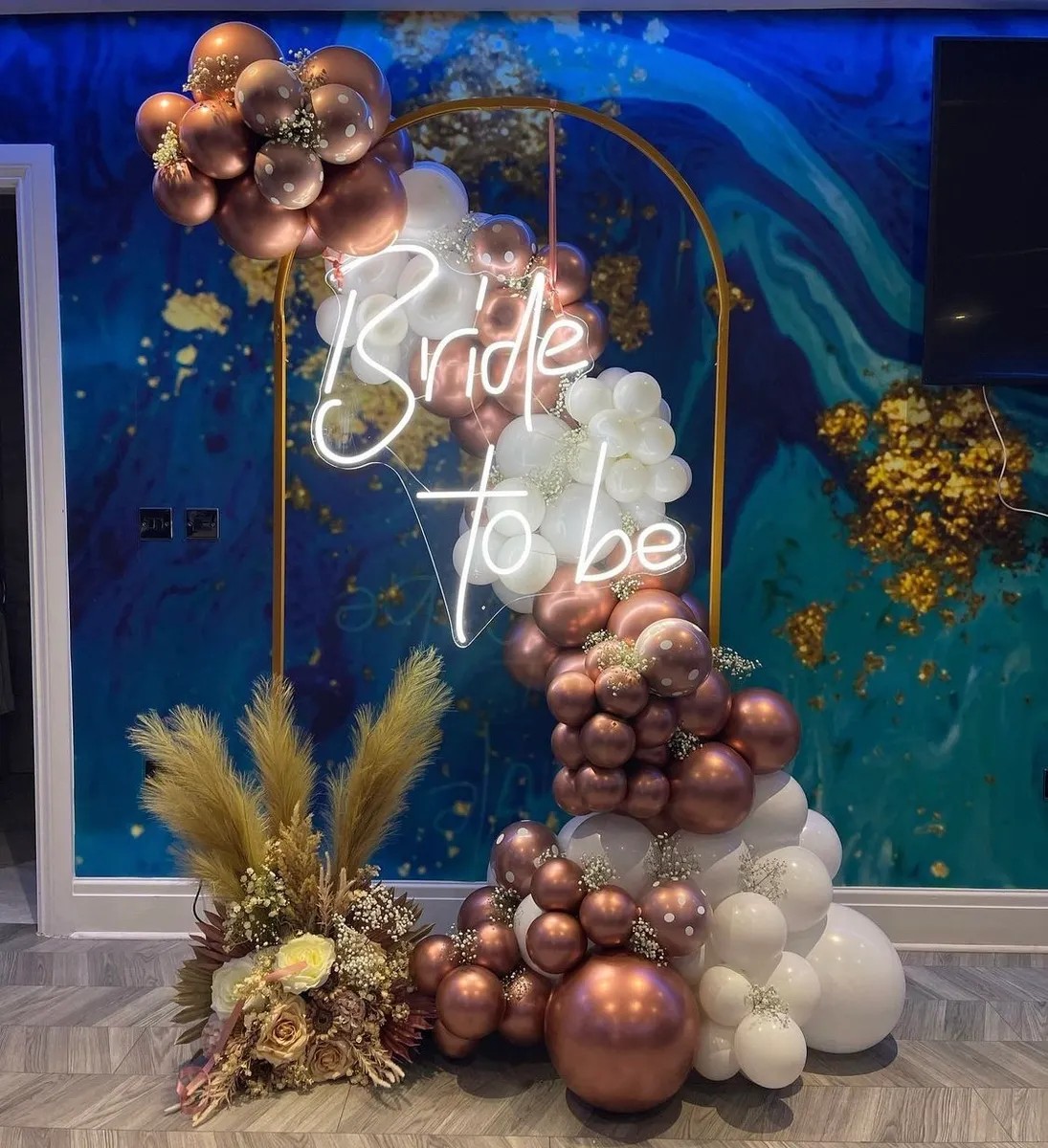 Neon “BRIDE TO BE” sign in cool white