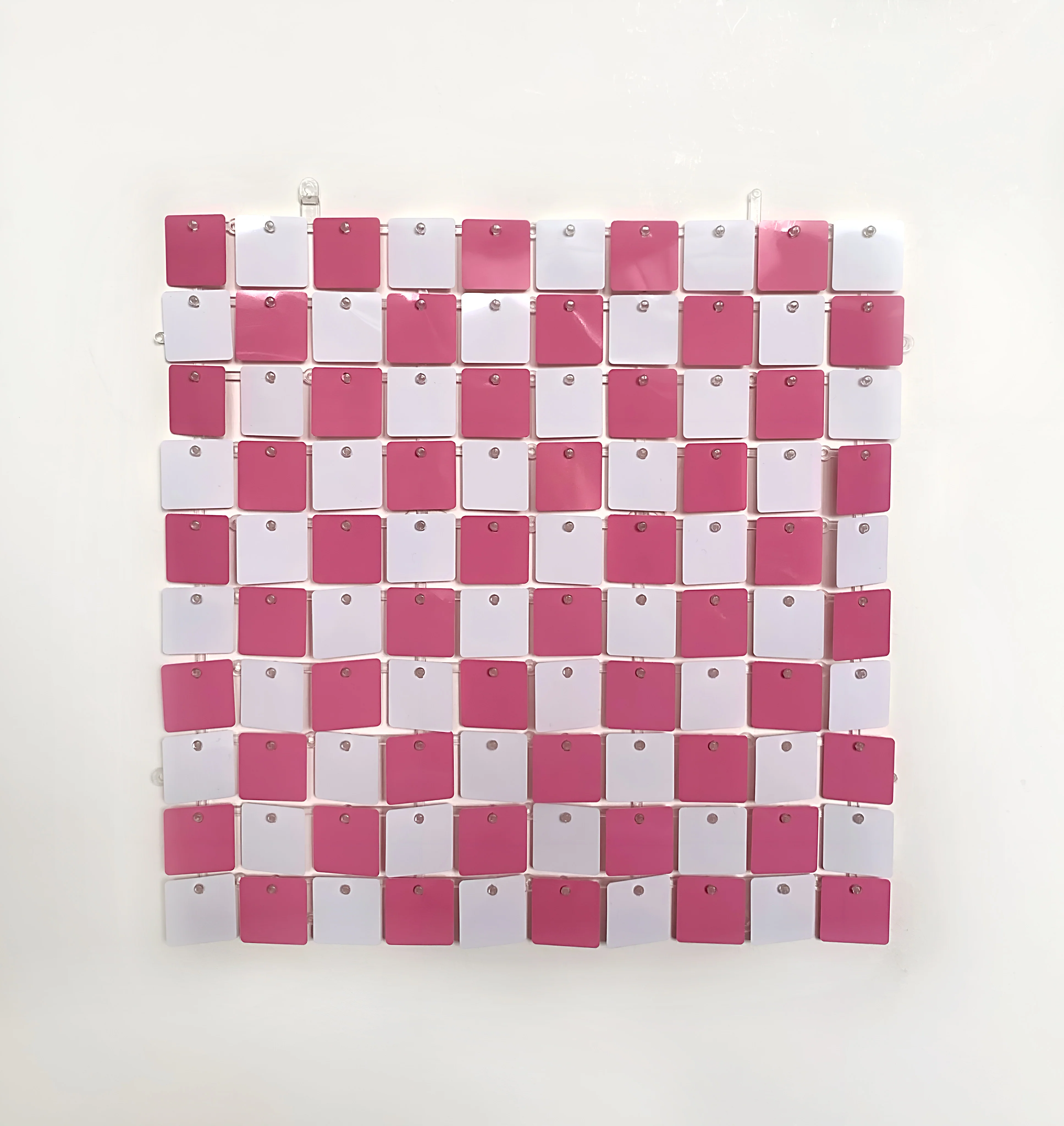Checkered pink & white sequin wall
