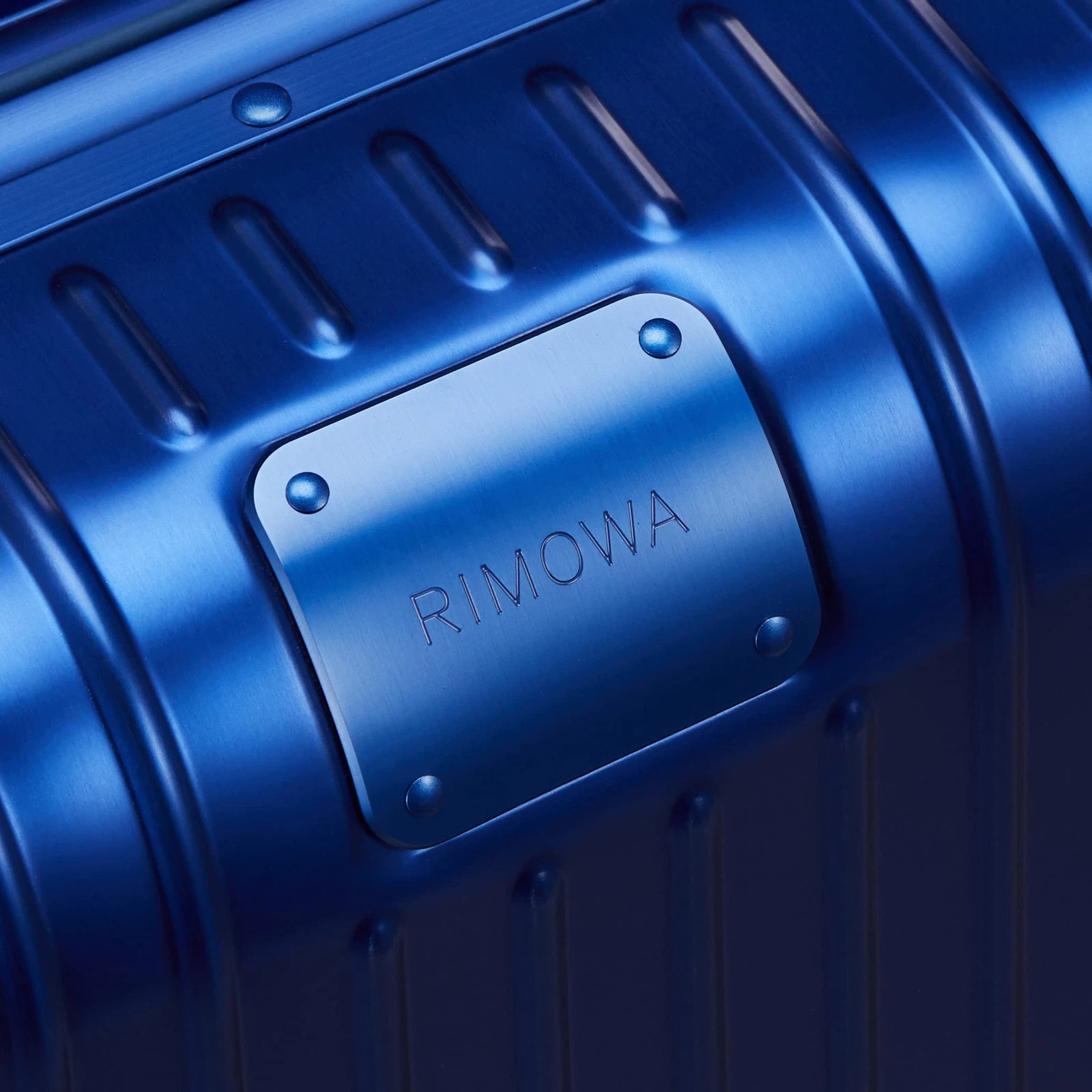 Originální cestovní kufr RIMOWA 35L – tmavě modrá, na 2–3 dny, hloubka 23 cm